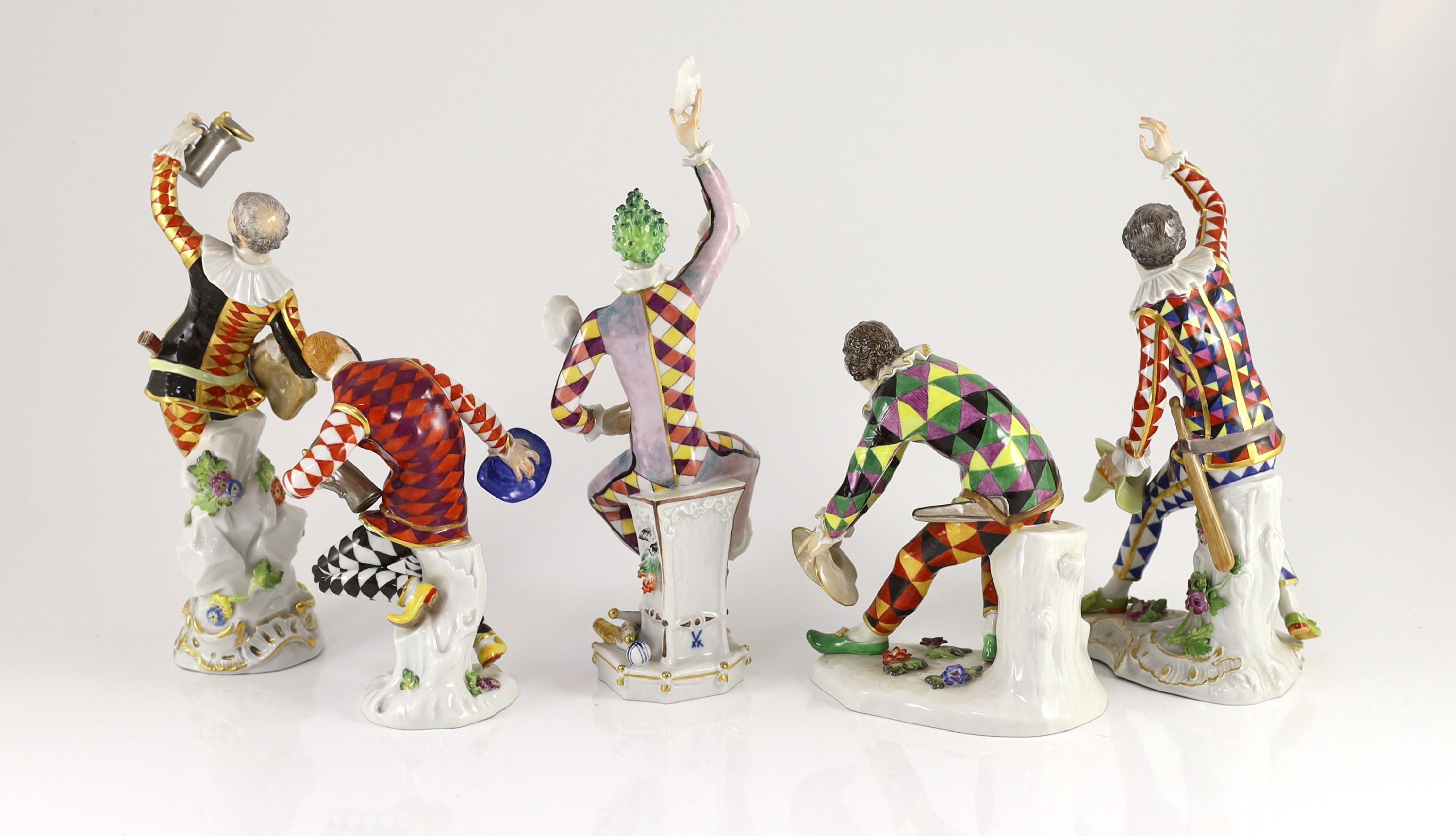 Five various Meissen figures of Harlequin, late 20th century, 15.5 cm – 26.5 cm